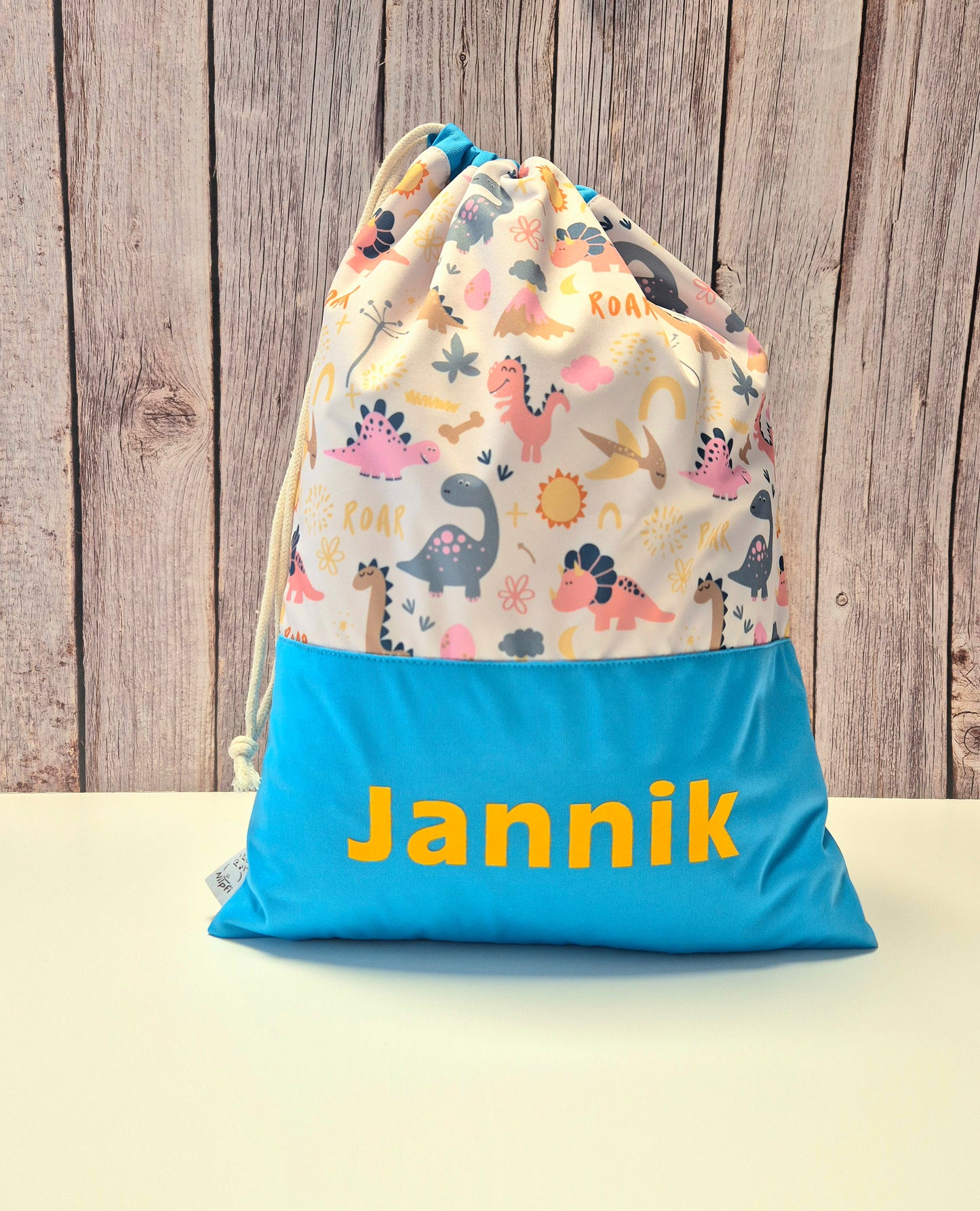 Nilpfi Turnbeutel Dino Mix – personalisiert für Kita & Kindergarten